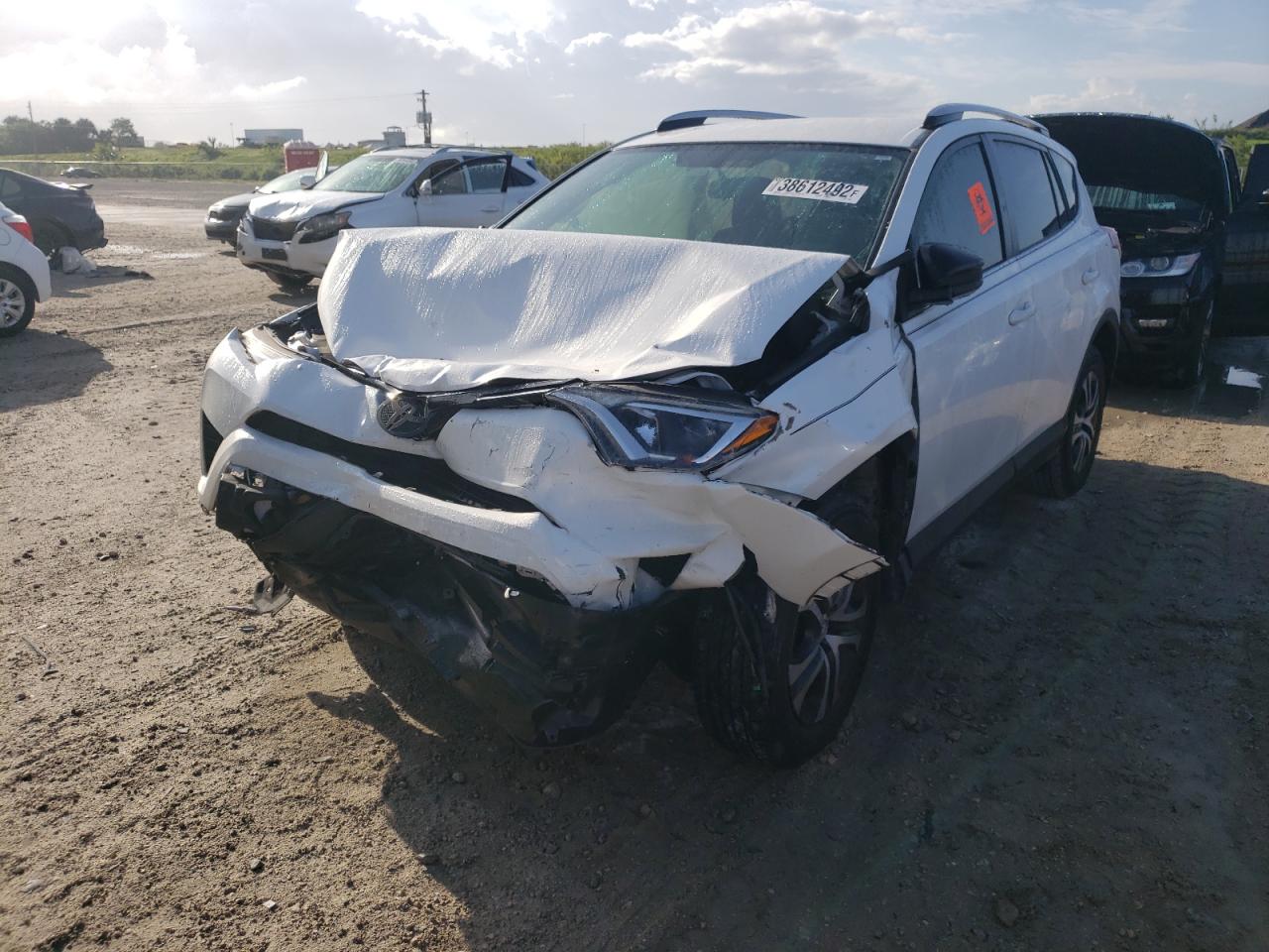 Photo 2 from auction – 2016 TOYOTA RAV4 LE with VIN JTMZFREV7GJ077032