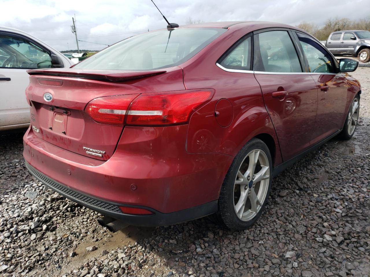 Photo 4 from auction – 2015 FORD FOCUS TITA with VIN 1FADP3J28FL298048