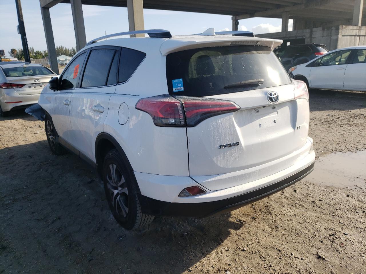 Photo 3 from auction – 2016 TOYOTA RAV4 LE with VIN JTMZFREV7GJ077032