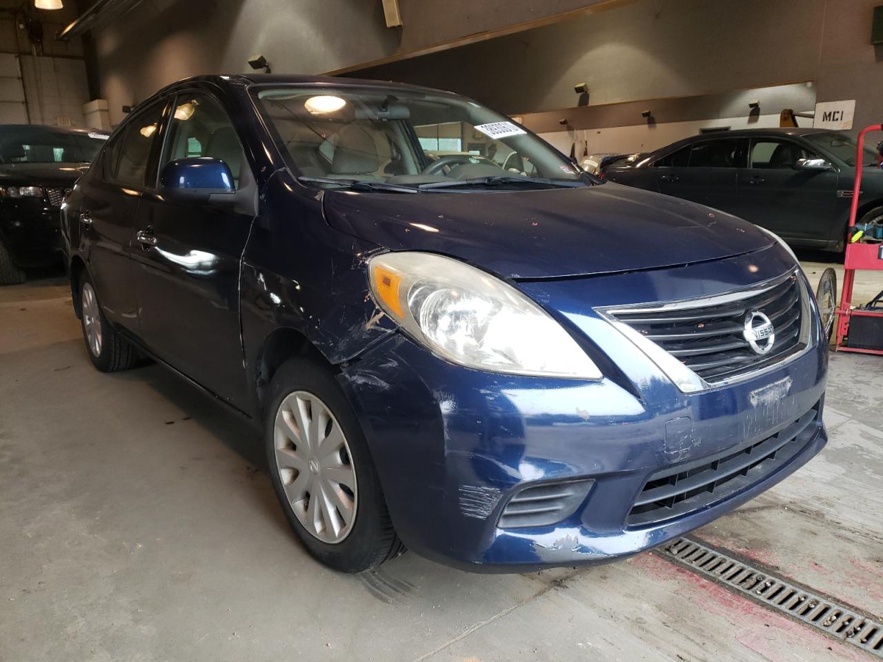 NISSAN VERSA S 2014 with VIN 3N1CN7AP4EL801675 - Photo from auction