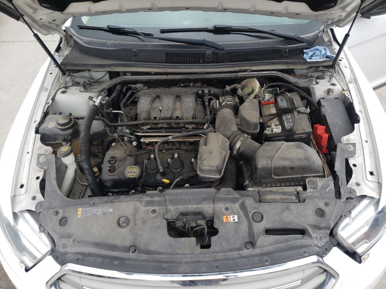 Photo 7 from auction – 2016 FORD TAURUS SE with VIN 1FAHP2D89GG150464