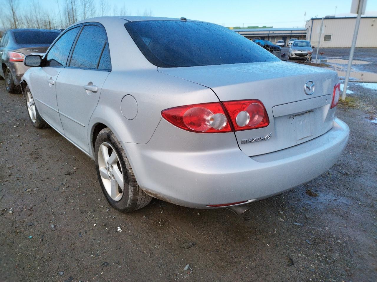 Photo 3 from auction – 2003 MAZDA 6 I with VIN 1YVFP80C935M14619