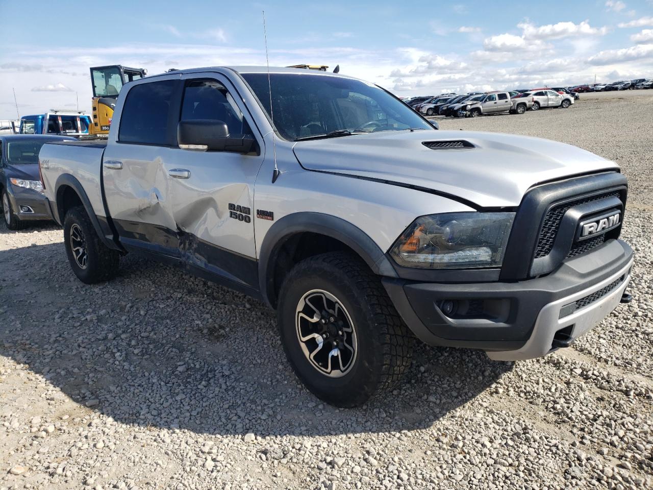RAM 1500 REBEL 2015 with VIN 1C6RR7YT8FS736337 - Photo from auction