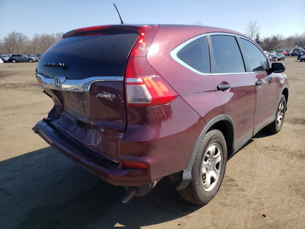 Photo 4 from auction – 2015 HONDA CR-V LX with VIN 5J6RM4H39FL046039