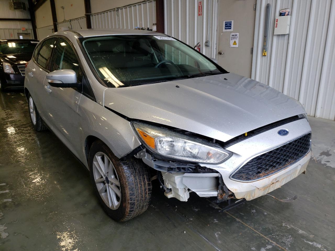 FORD FOCUS SE 2017 with VIN 1FADP3K20HL216220 - Photo from auction