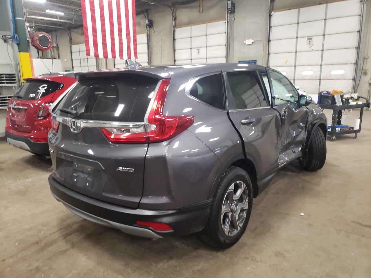 Photo 4 from auction – 2019 HONDA CR-V with VIN 2HKRW2H85KH671925