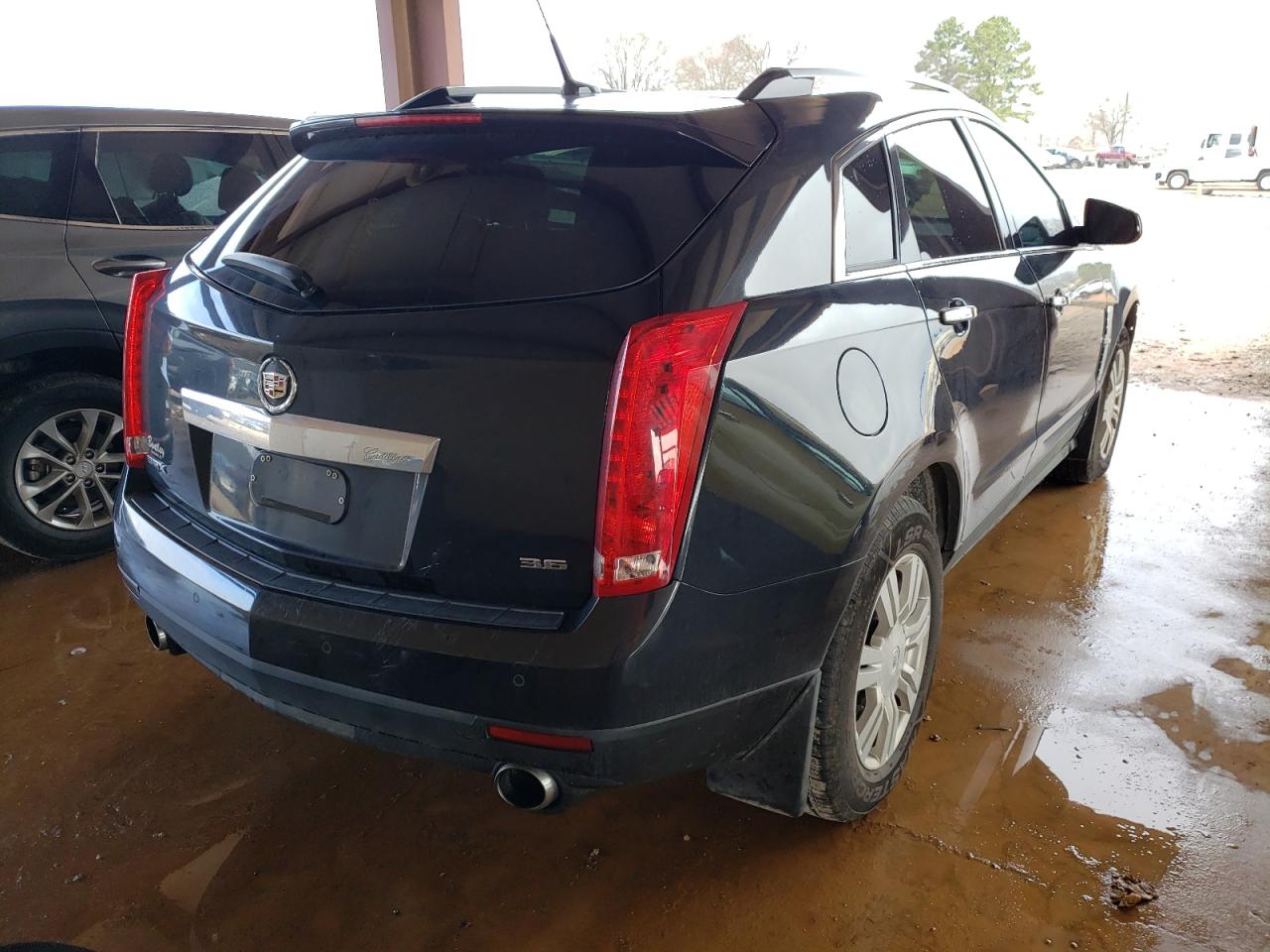 Photo 4 from auction – 2012 CADILLAC SRX LUXURY with VIN 3GYFNAE37CS597224