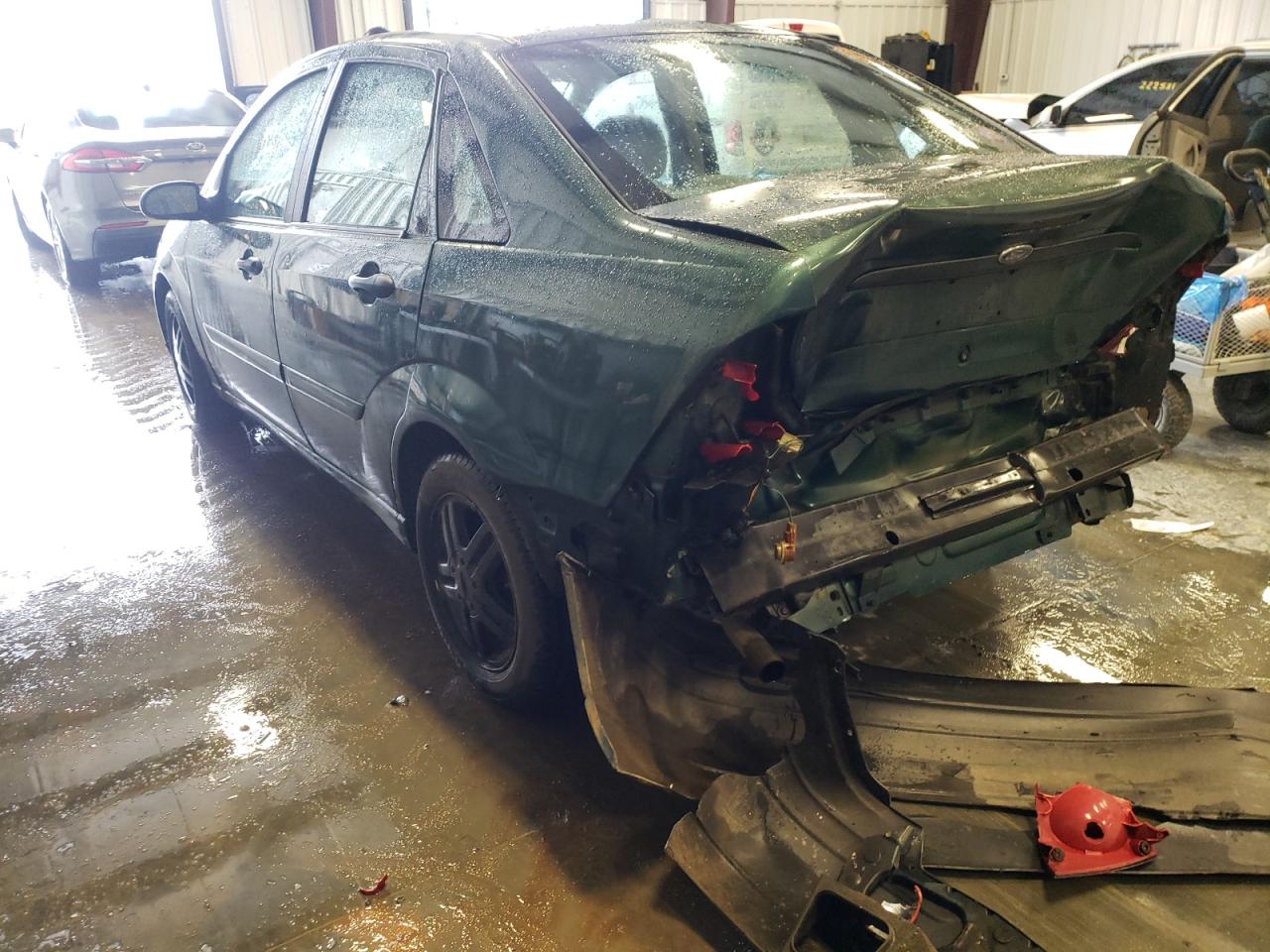 Photo 3 from auction – 2000 FORD FOCUS with VIN 1FAFP343XYW386226