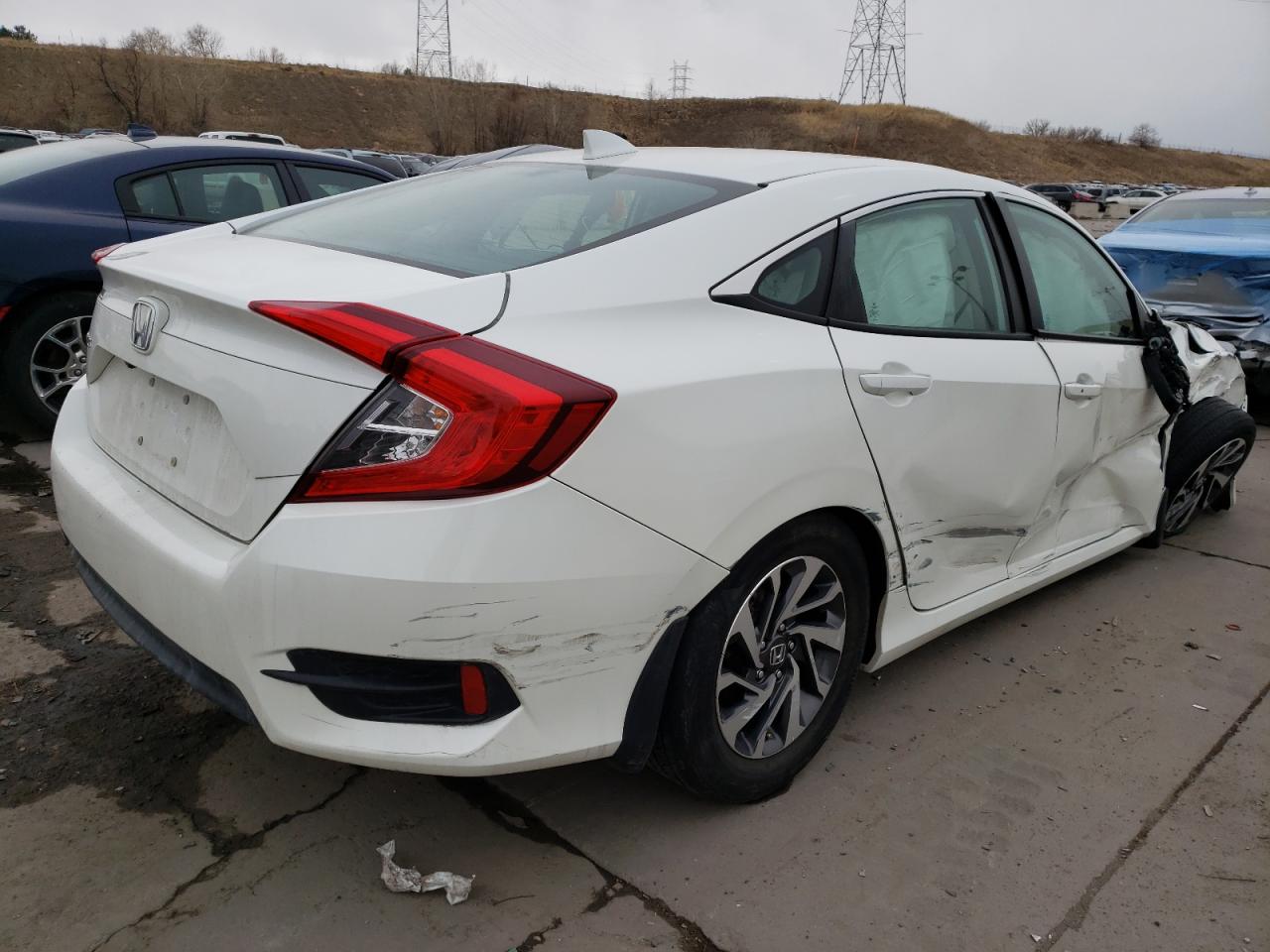 Photo 4 from auction – 2017 HONDA CIVIC EX with VIN 2HGFC2F72HH544512