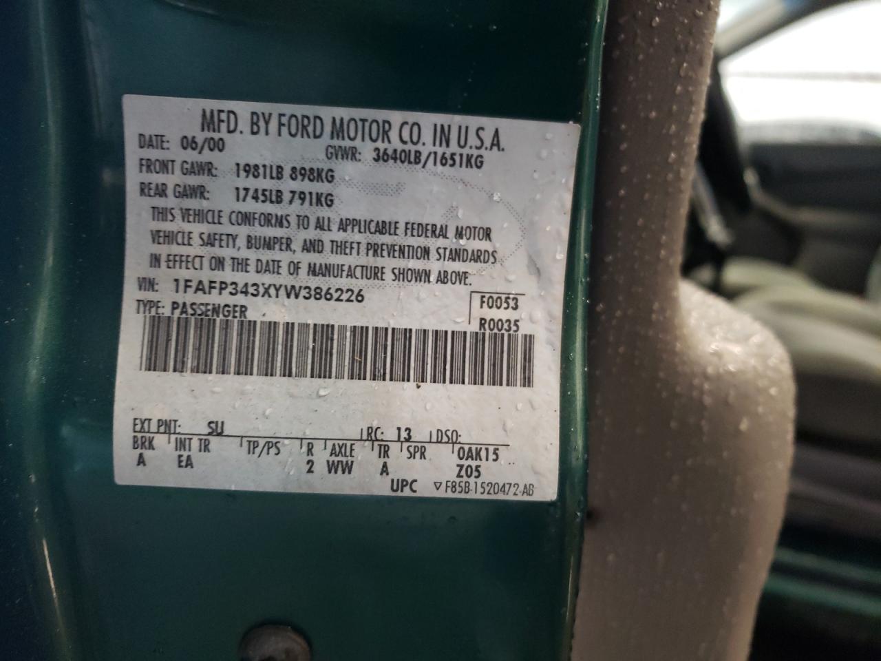 Photo 10 from auction – 2000 FORD FOCUS with VIN 1FAFP343XYW386226