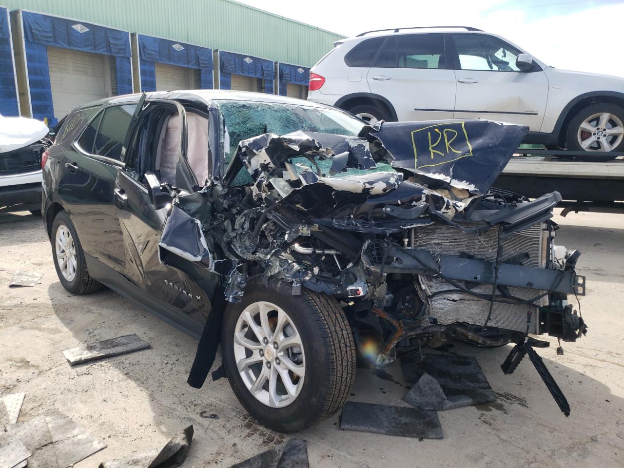 CHEVROLET EQUINOX LT 2020 with VIN 3GNAXUEV9LS585628 - Photo from auction