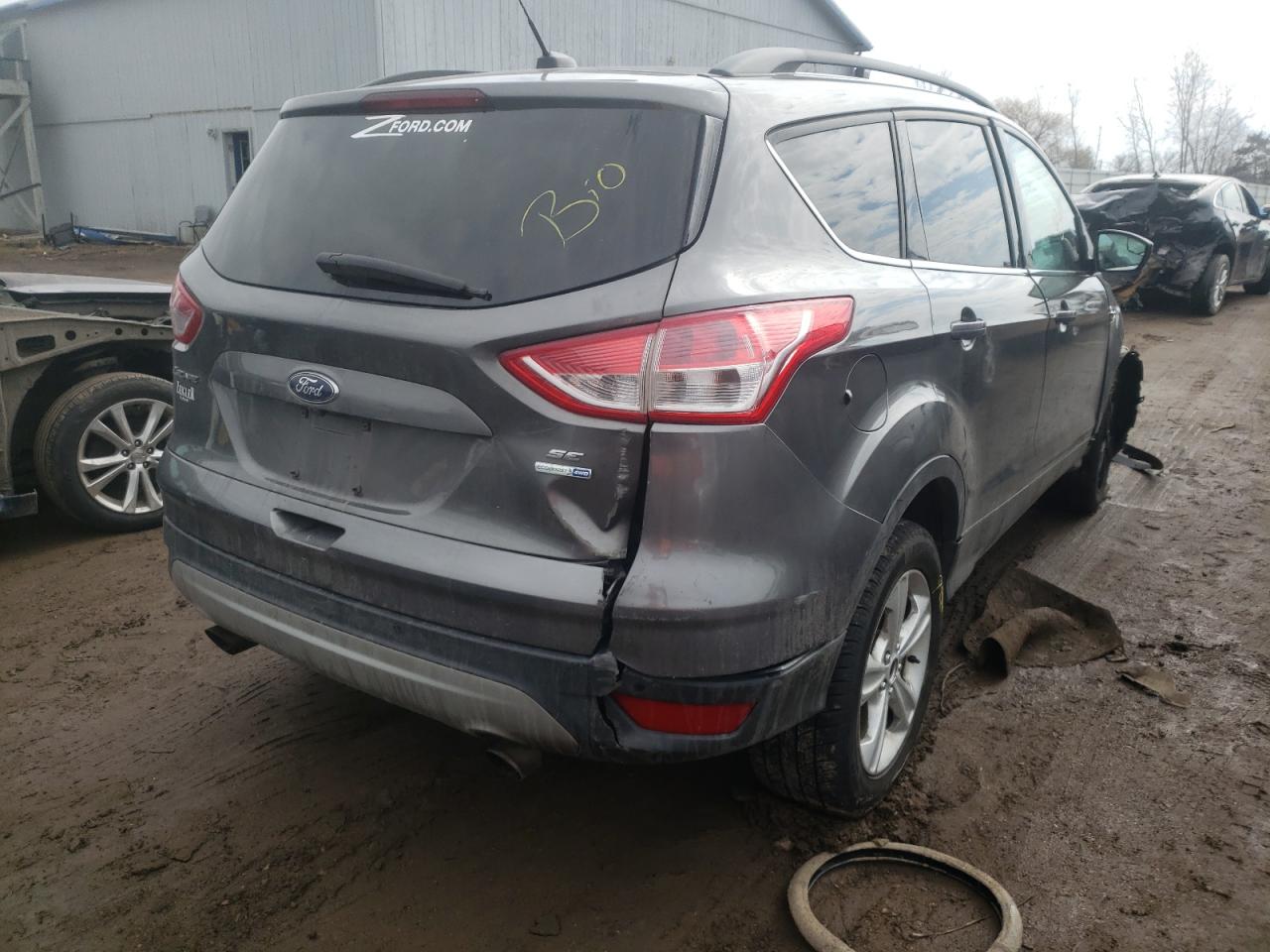 Zdjęcie 4 z aukcji – 2014 FORD ESCAPE SE z VIN 1FMCU9G95EUC00653