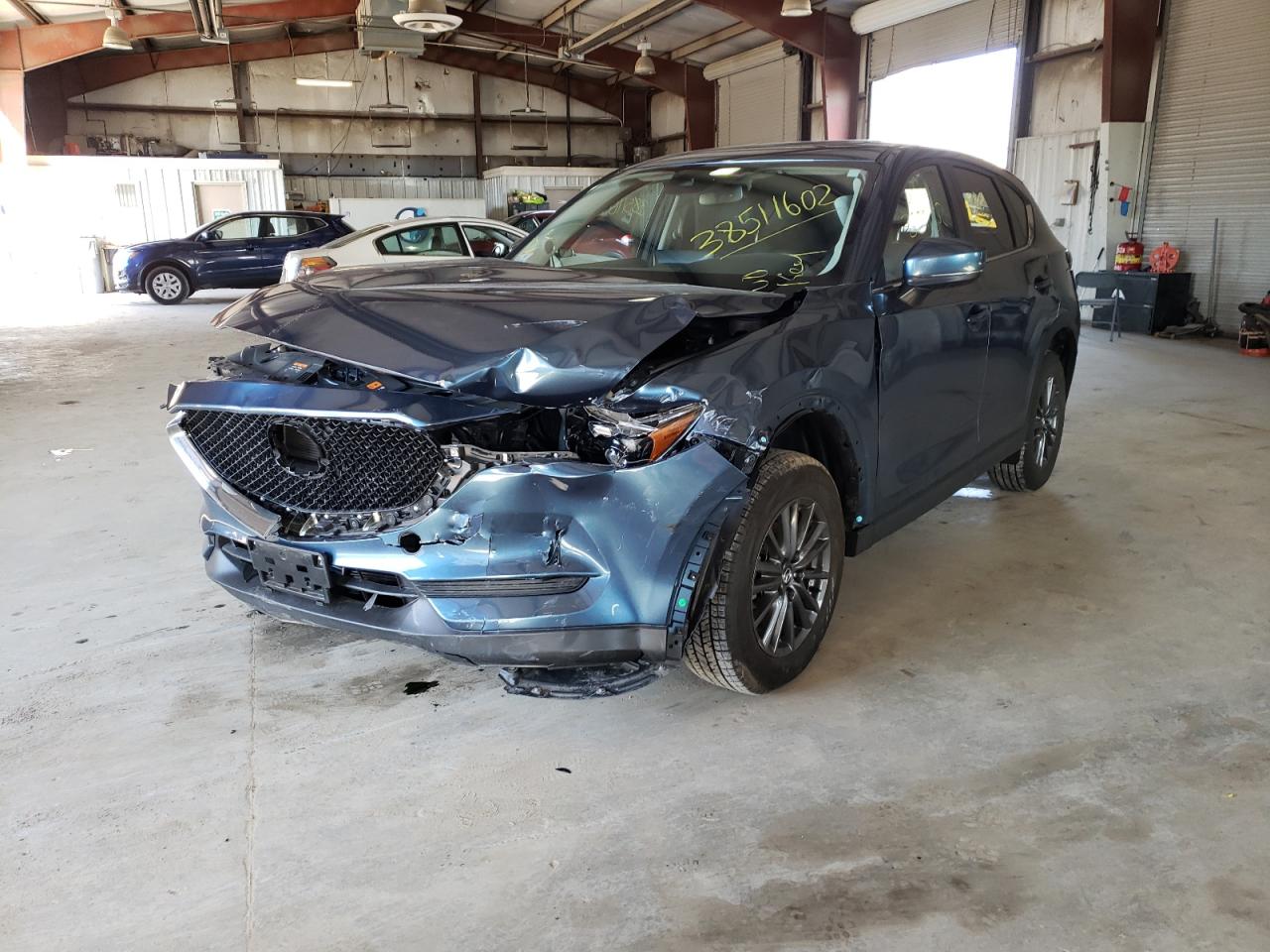 Photo 2 from auction – 2021 MAZDA CX-5 TOURI with VIN JM3KFBCM8M1360447