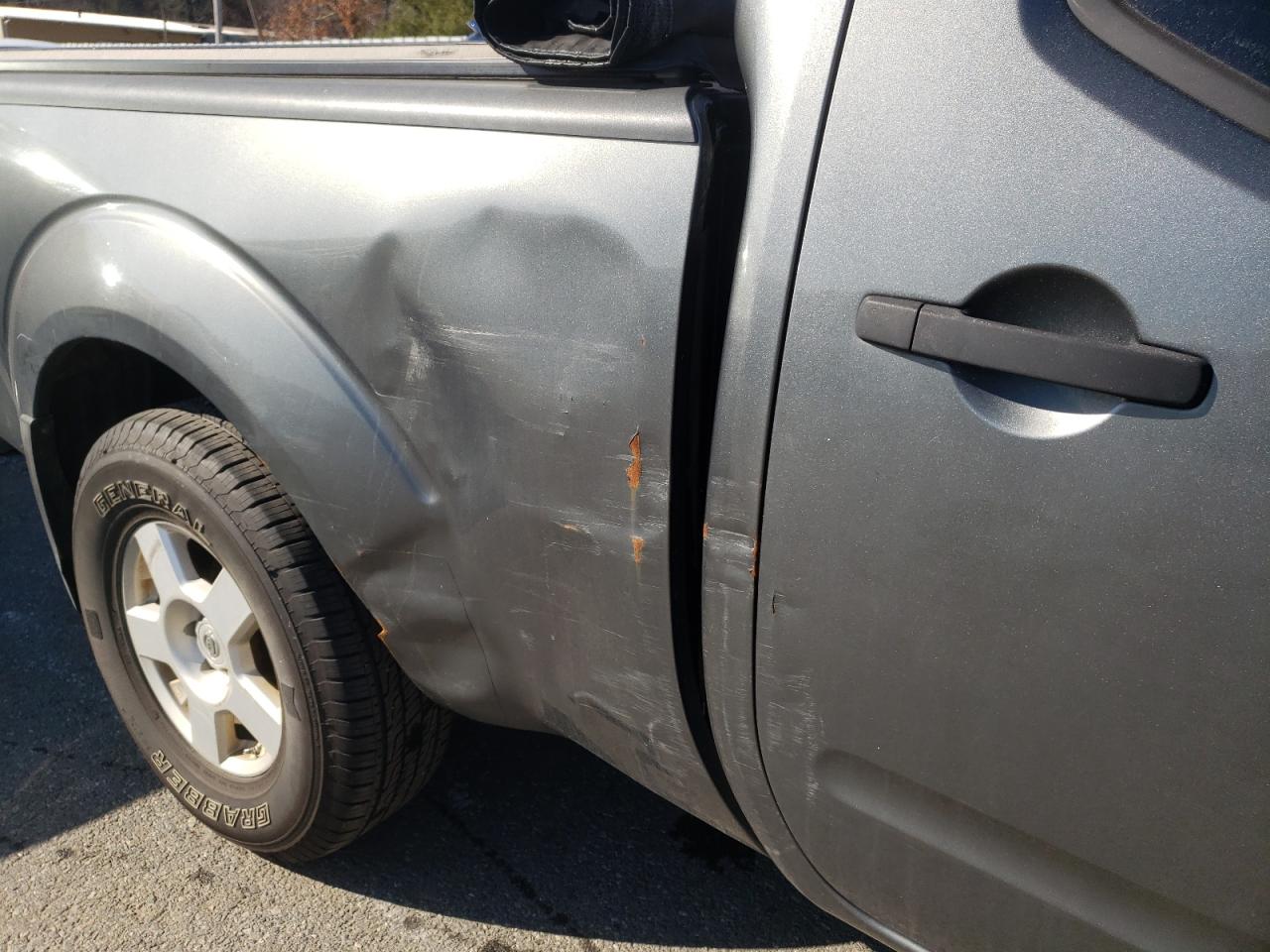 Photo 9 from auction – 2007 NISSAN FRONTIER C with VIN 1N6AD09W17C438158