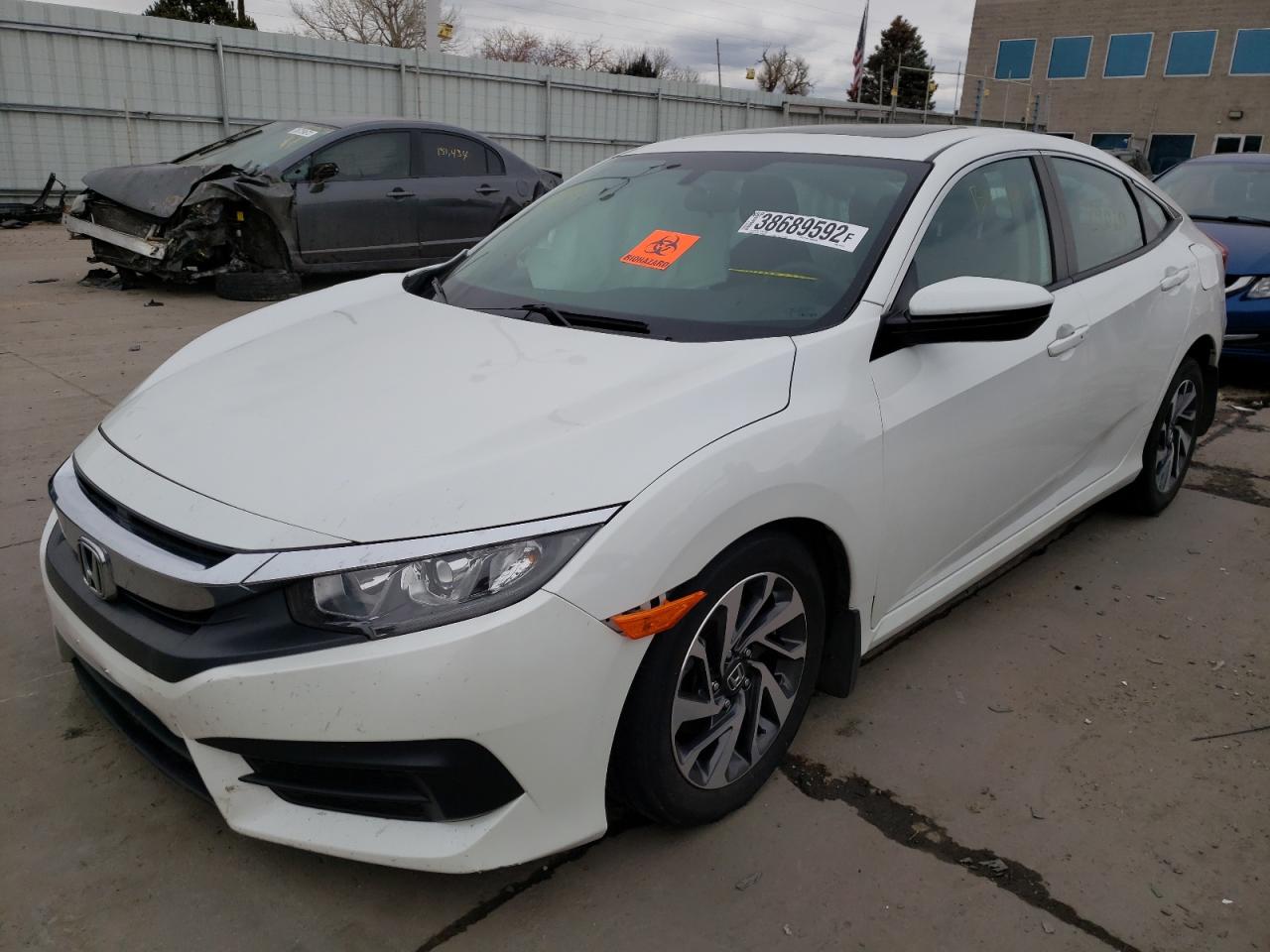 Photo 2 from auction – 2017 HONDA CIVIC EX with VIN 2HGFC2F72HH544512