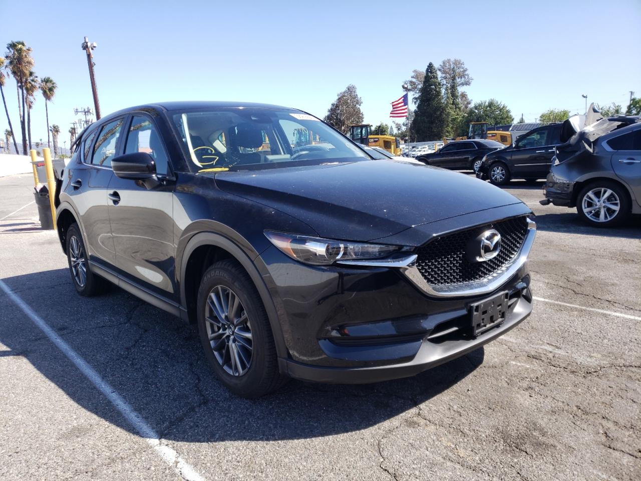 MAZDA CX-5 SPORT 2019 with VIN JM3KFABM1K1566444 - Photo from auction