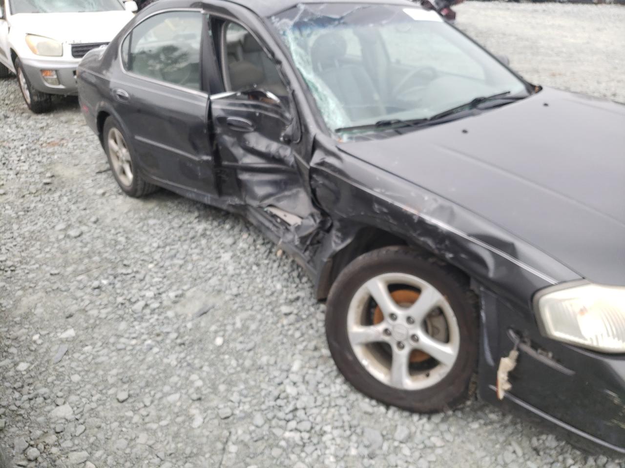 Photo 9 from auction – 2001 NISSAN MAXIMA GXE with VIN JN1CA31D51T625980