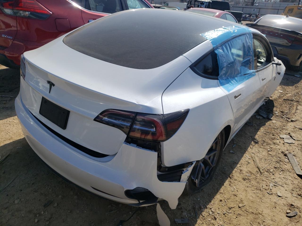 Photo 4 from auction – 2021 TESLA MODEL 3 with VIN 5YJ3E1EA5MF854298