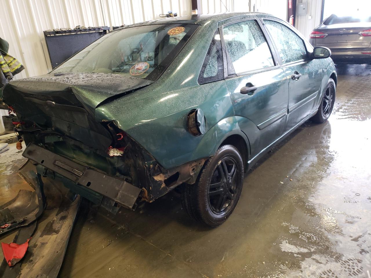 Photo 4 from auction – 2000 FORD FOCUS with VIN 1FAFP343XYW386226