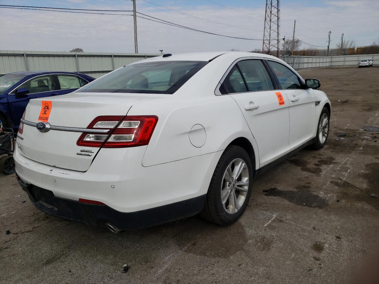 Photo 4 from auction – 2015 FORD TAURUS SEL with VIN 1FAHP2E8XFG126364