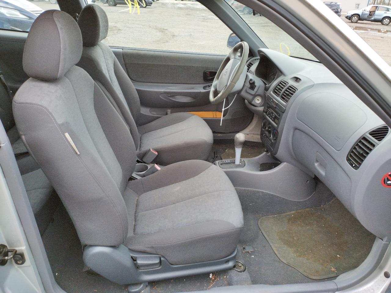 Photo 5 from auction – 2004 HYUNDAI ACCENT GL with VIN KMHCG35C94U303916
