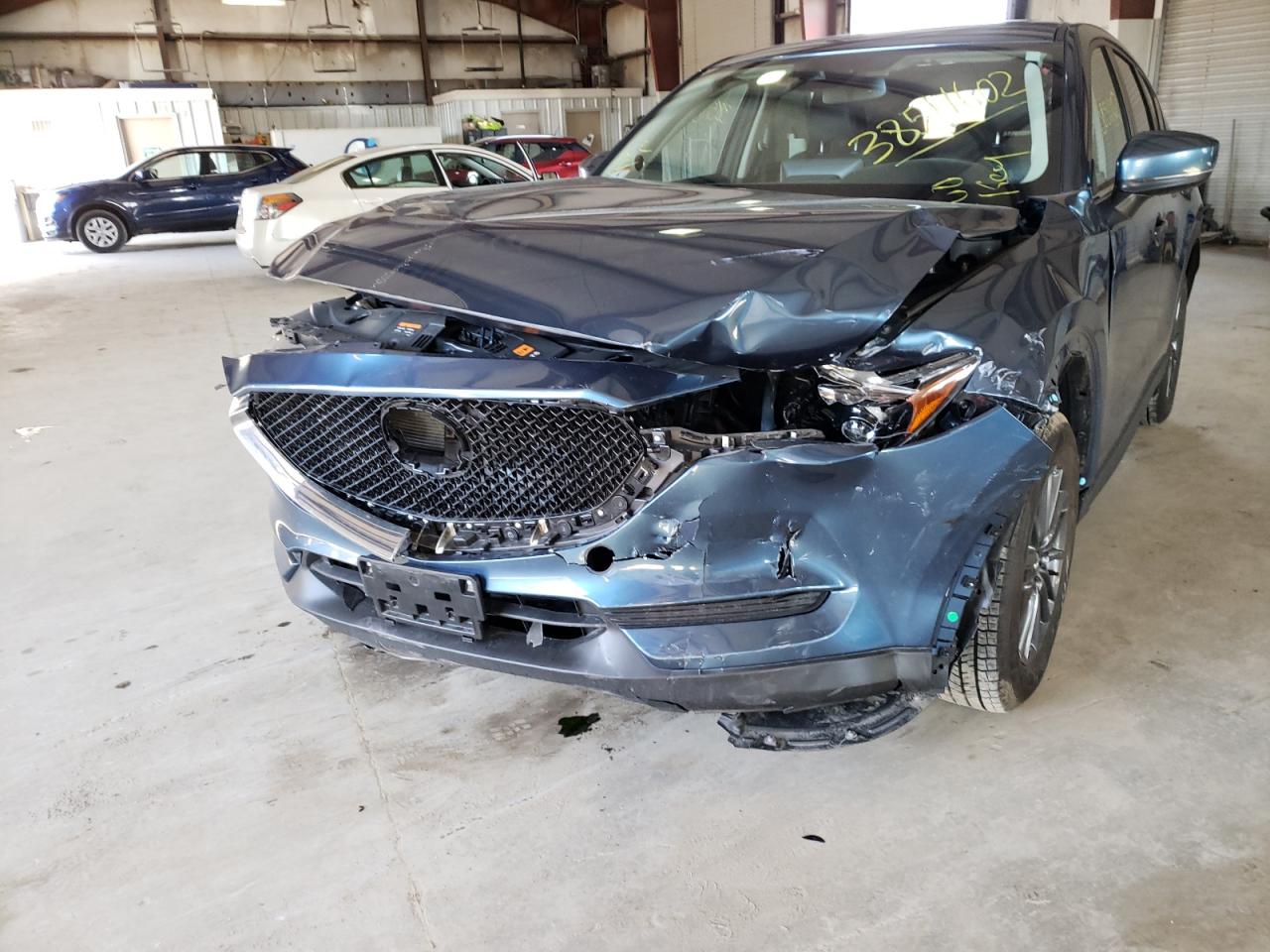Photo 9 from auction – 2021 MAZDA CX-5 TOURI with VIN JM3KFBCM8M1360447