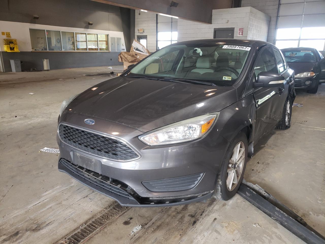 Photo 2 from auction – 2015 FORD FOCUS SE with VIN 1FADP3F26FL228458