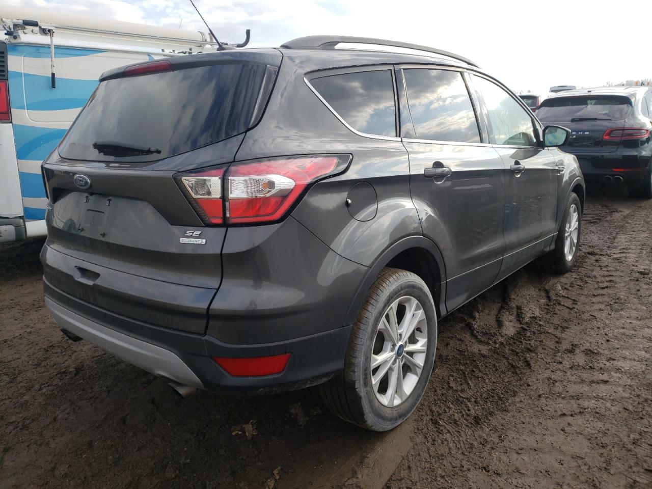 Photo 4 from auction – 2018 FORD ESCAPE SE with VIN 1FMCU0GD0JUC11750