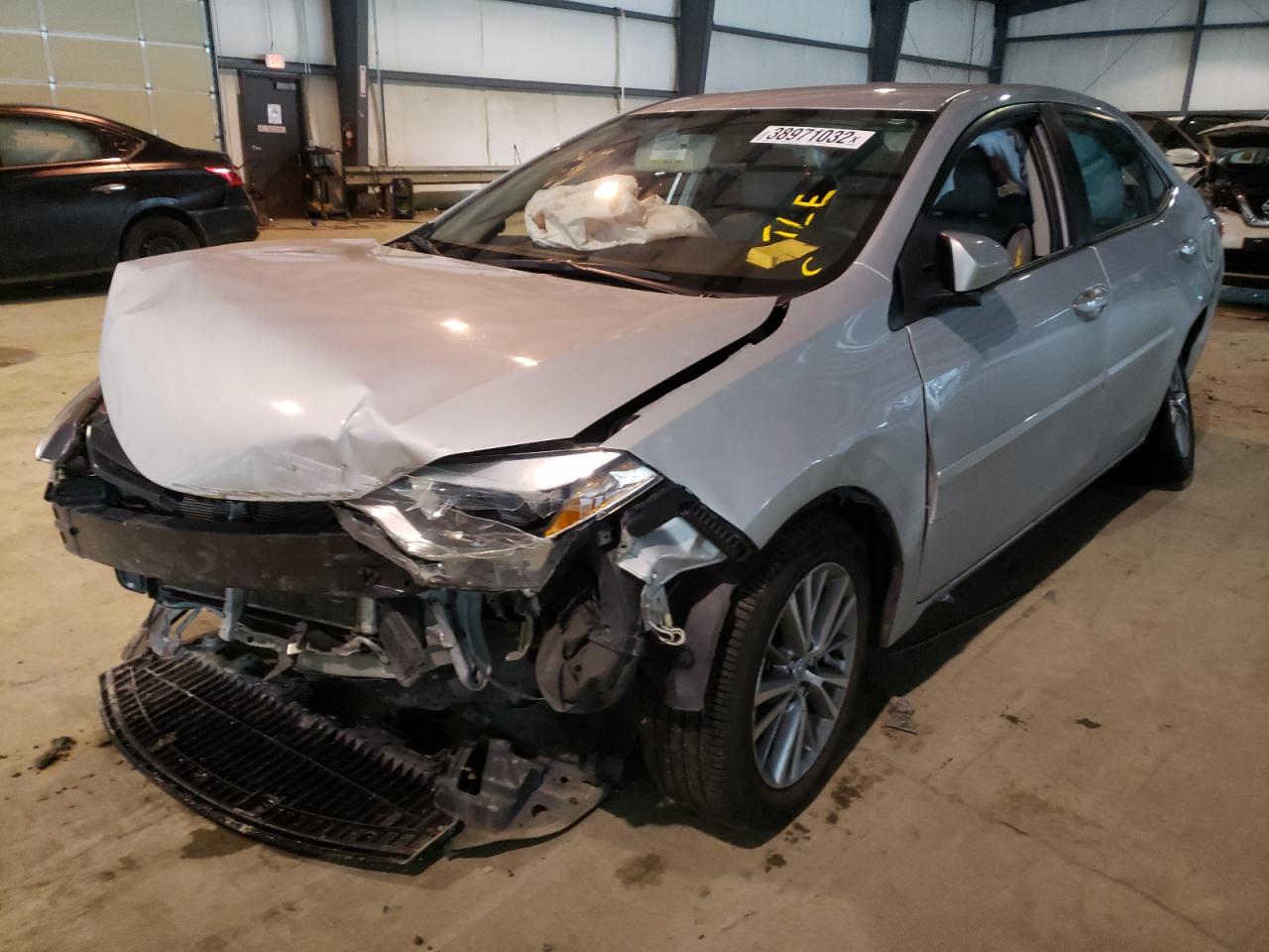 Photo 2 from auction – 2014 TOYOTA COROLLA L with VIN 2T1BURHEXEC169425