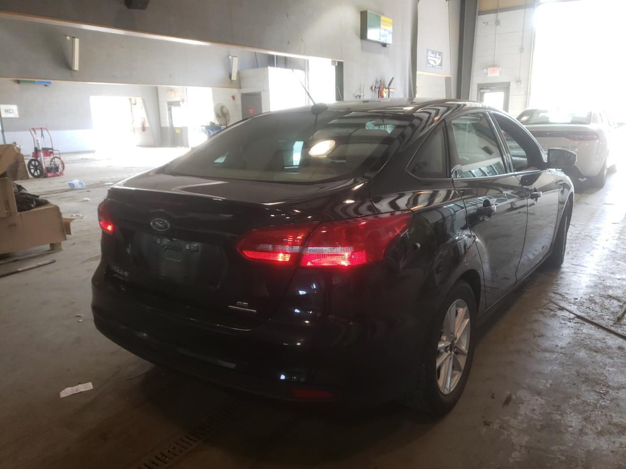 Photo 4 from auction – 2015 FORD FOCUS SE with VIN 1FADP3F27FL259959