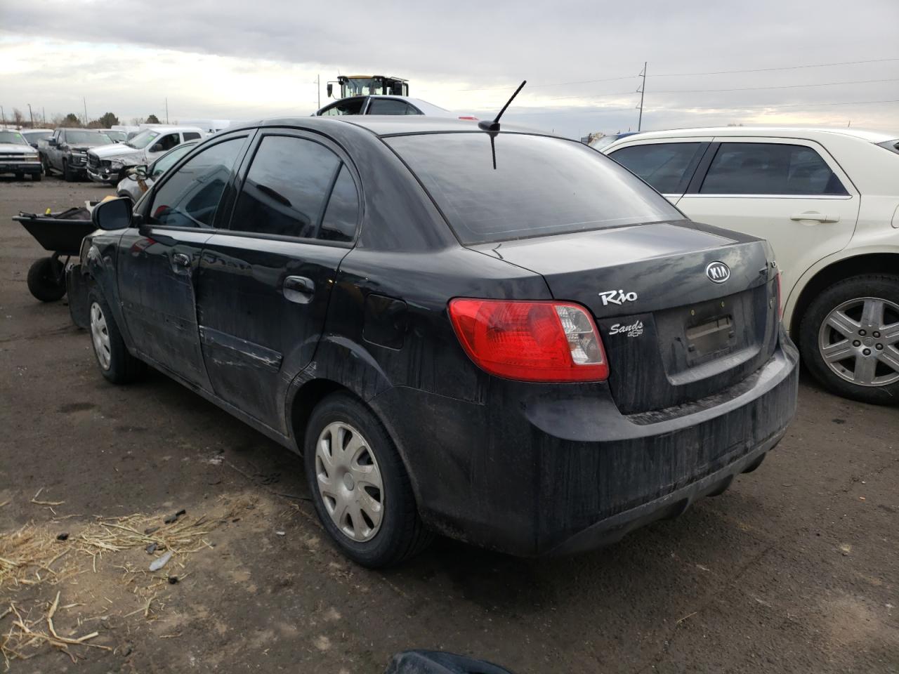 Photo 3 from auction – 2011 KIA RIO BASE with VIN KNADH4A35B6959854