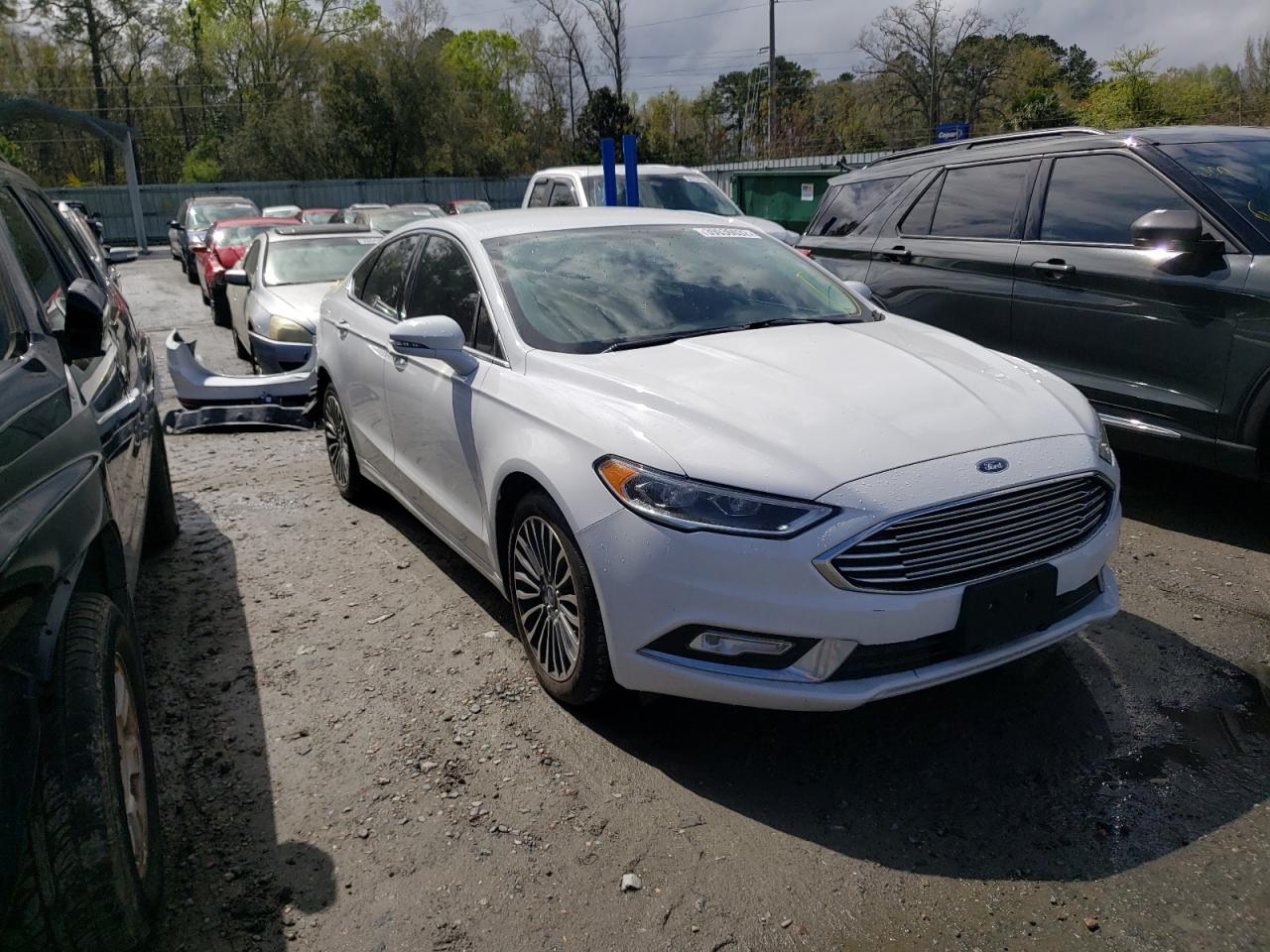 FORD FUSION TIT 2017 with VIN 3FA6P0D90HR260754 - Photo from auction