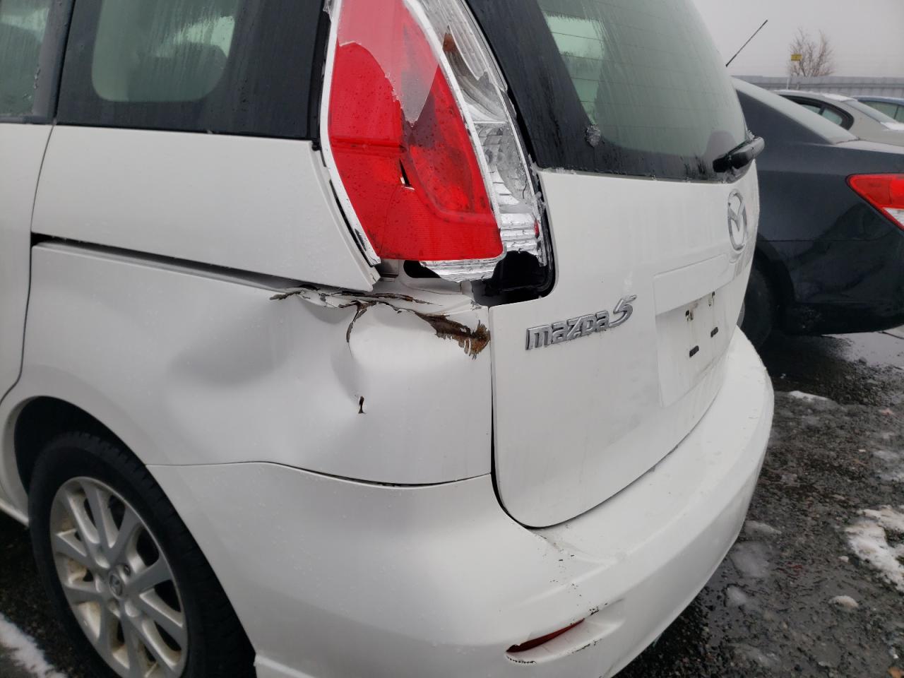 Photo 9 from auction – 2010 MAZDA 5 with VIN JM1CR2W39A0389724