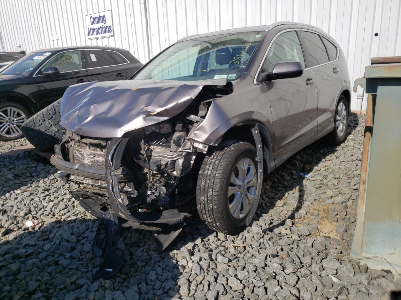 Photo 2 from auction – 2012 HONDA CR-V EXL with VIN 5J6RM4H79CL017204