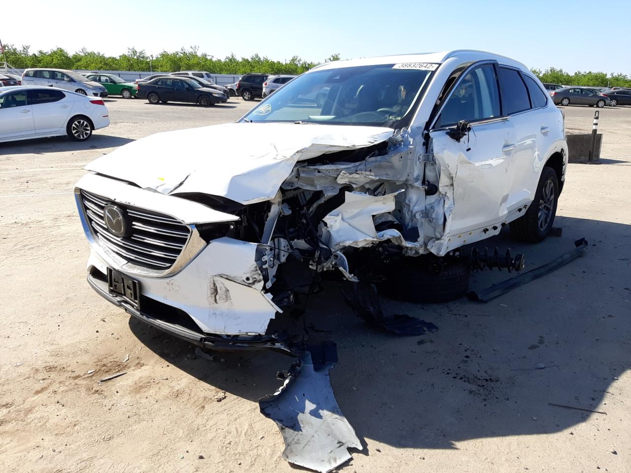 Photo 2 from auction – 2021 MAZDA CX-9 TOURI with VIN JM3TCACYXM0529335