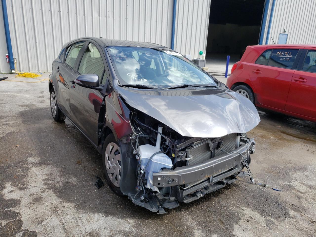 TOYOTA PRIUS C 2015 with VIN JTDKDTB39F1104012 - Photo from auction
