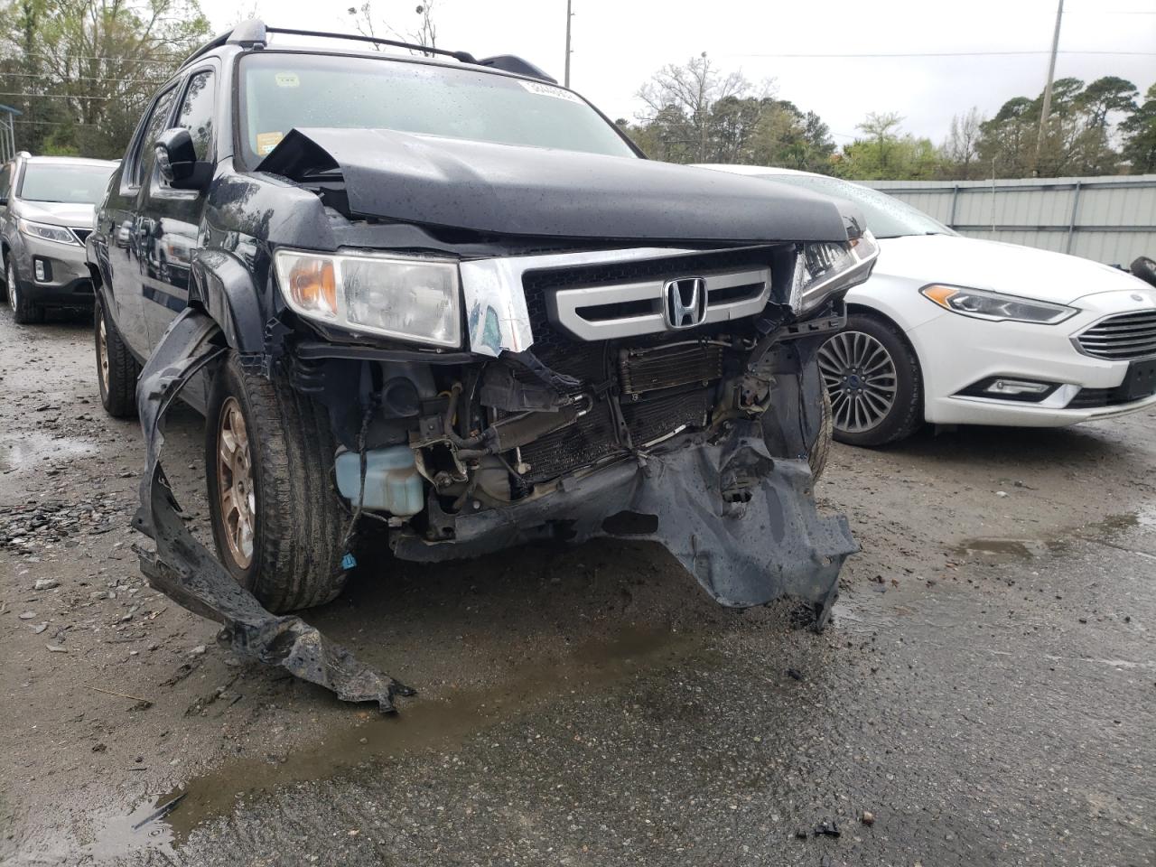 Photo 9 from auction – 2009 HONDA RIDGELINE with VIN 5FPYK16429B100555