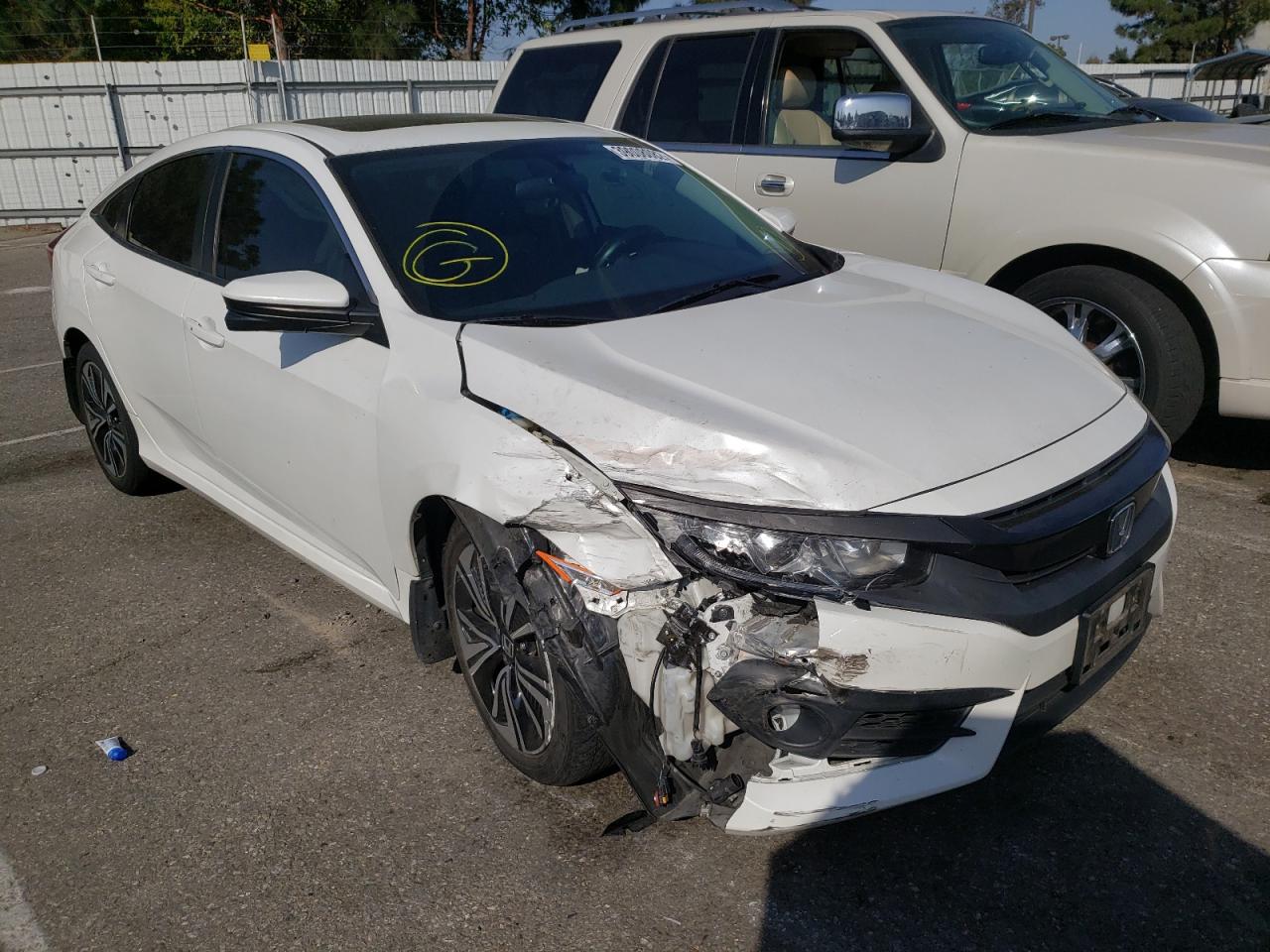HONDA CIVIC EX 2017 with VIN 2HGFC1F36HH642210 - Photo from auction
