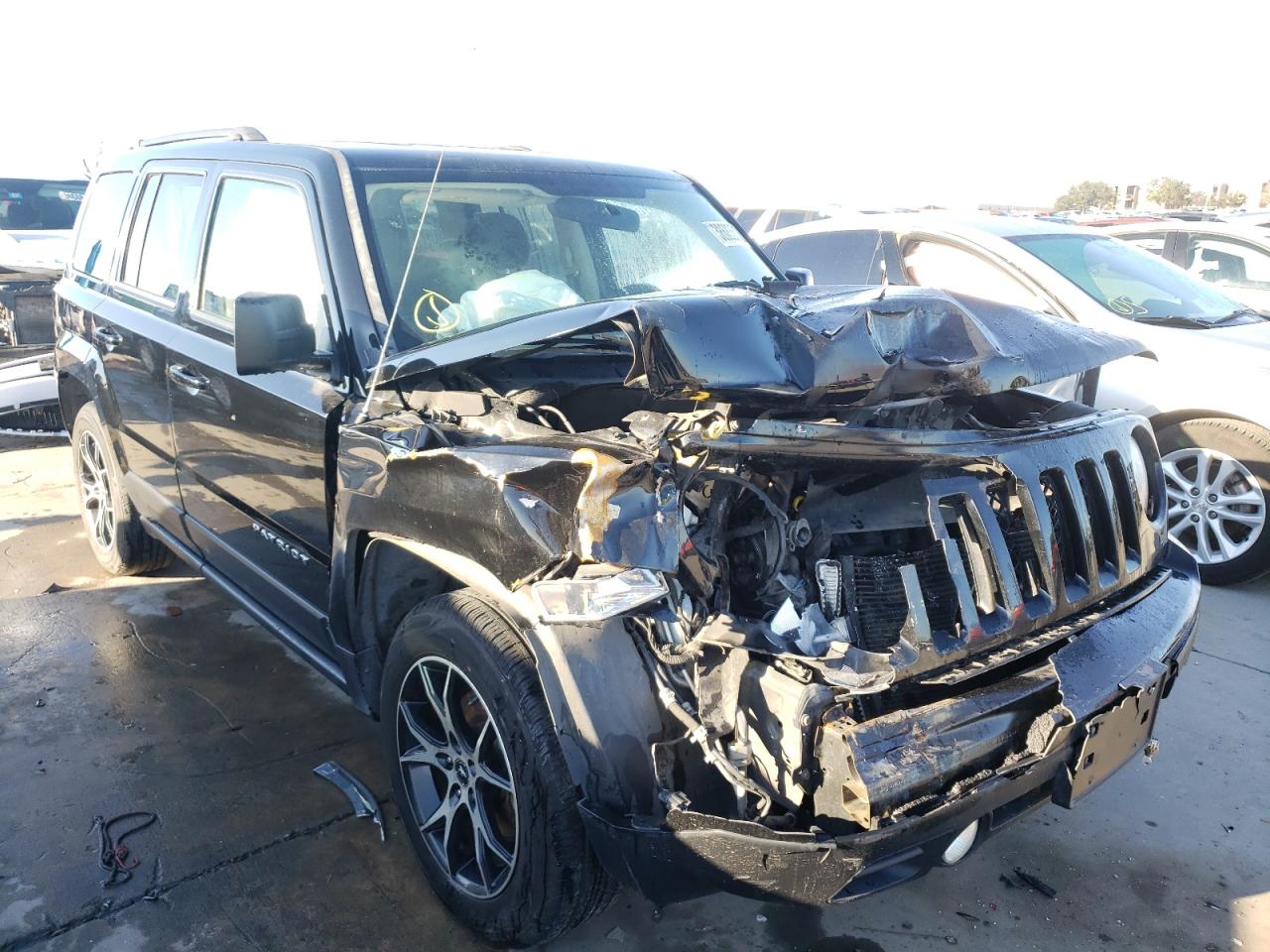 Photo 1 from auction – 2014 JEEP PATRIOT SP with VIN 1C4NJPBB5ED889758