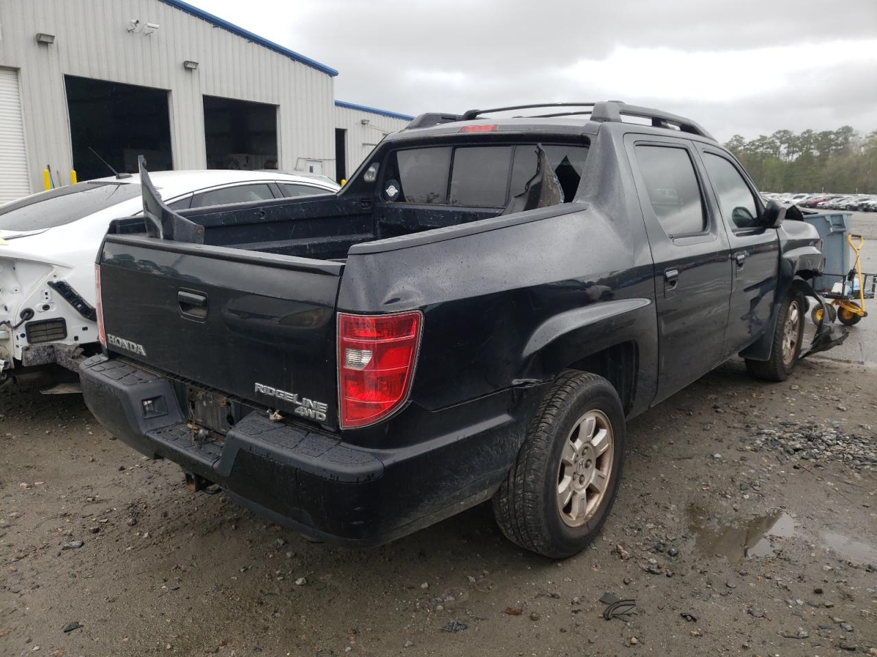 Photo 4 from auction – 2009 HONDA RIDGELINE with VIN 5FPYK16429B100555