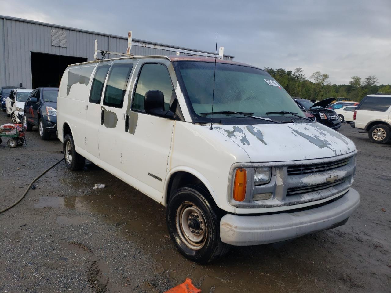 CHEVROLET EXPRESS G3 2000 with VIN 1GCHG39R2Y1243297 - Photo from auction