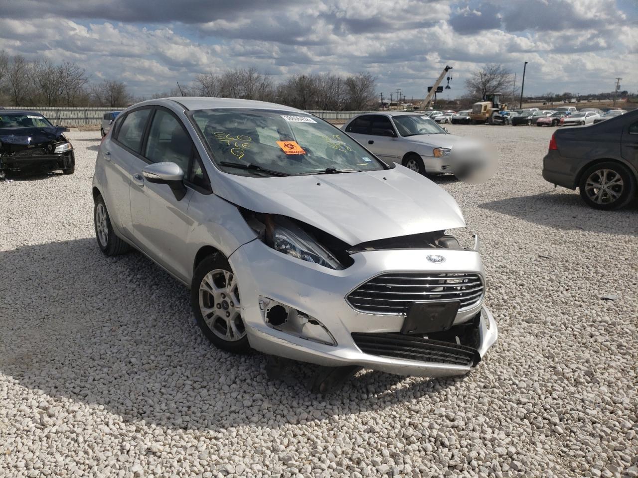 FORD FIESTA SE 2014 with VIN 3FADP4EJ3EM145212 - Photo from auction