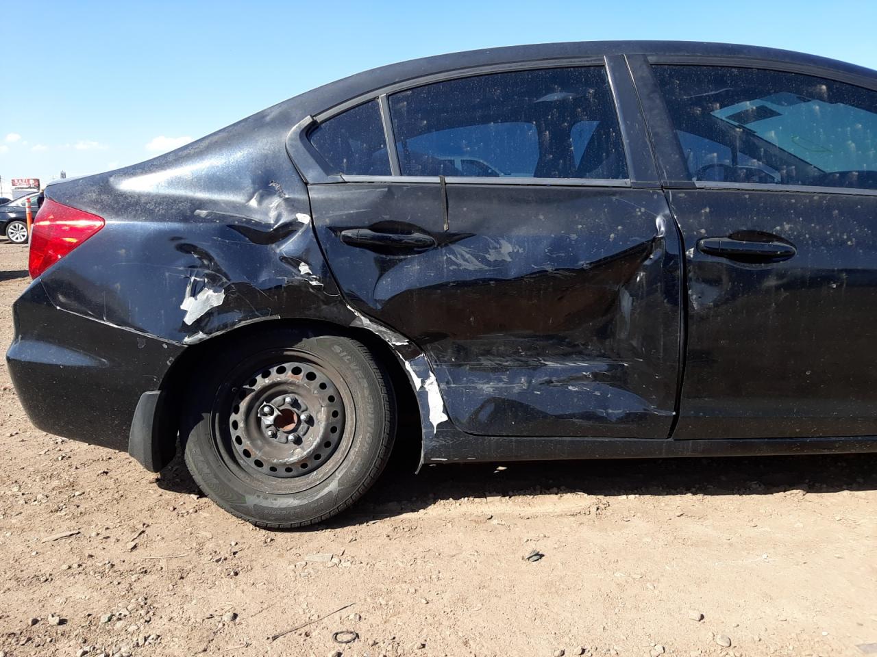 Photo 9 from auction – 2012 HONDA CIVIC LX with VIN 2HGFB2F53CH585323