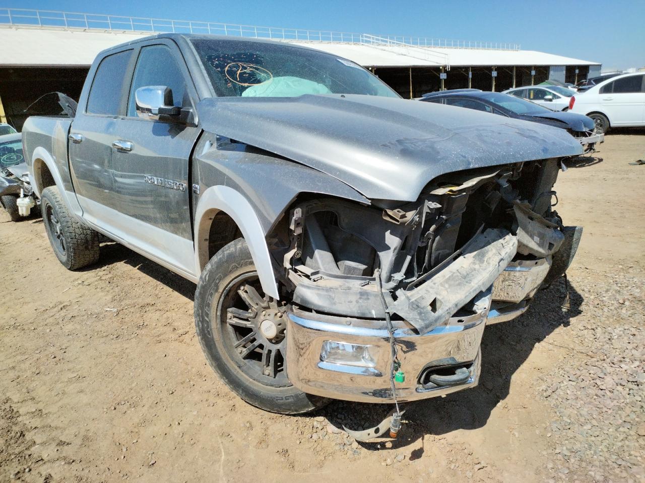 DODGE RAM 1500 L 2012 with VIN 1C6RD7NT6CS247482 - Photo from auction
