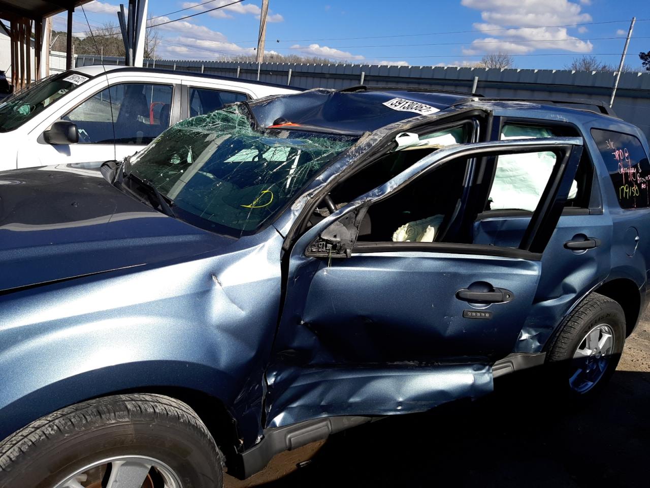 Photo 9 from auction – 2011 FORD ESCAPE XLT with VIN 1FMCU0DG2BKB40952