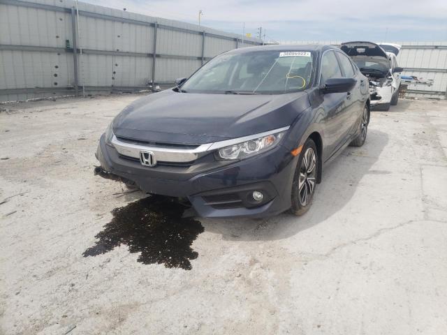 Photo 2 from auction – 2018 HONDA CIVIC EX with VIN JHMFC1F37JX002540