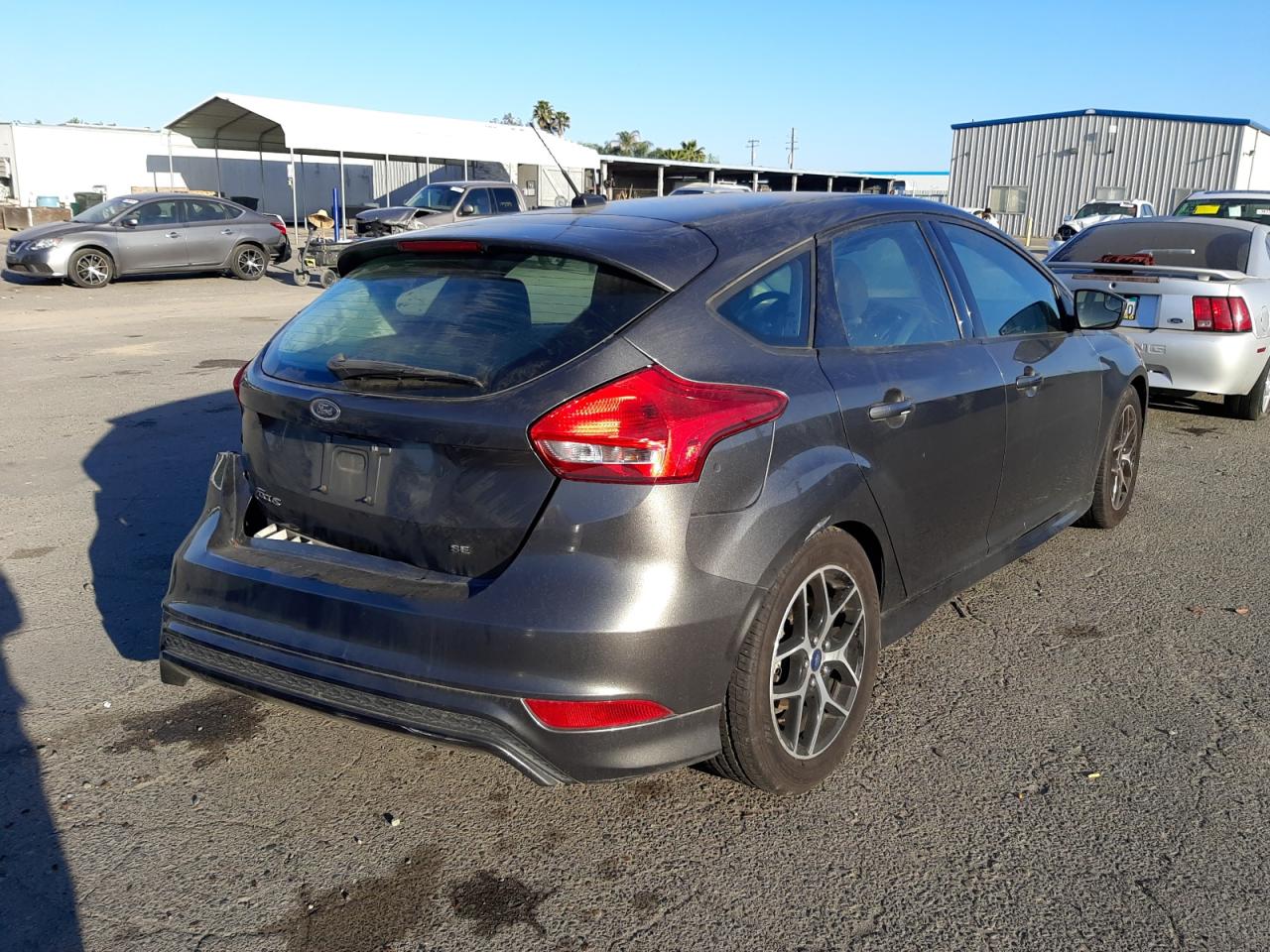 Фото 4 с аукциона – 2015 FORD FOCUS SE с VIN 1FADP3K23FL241643