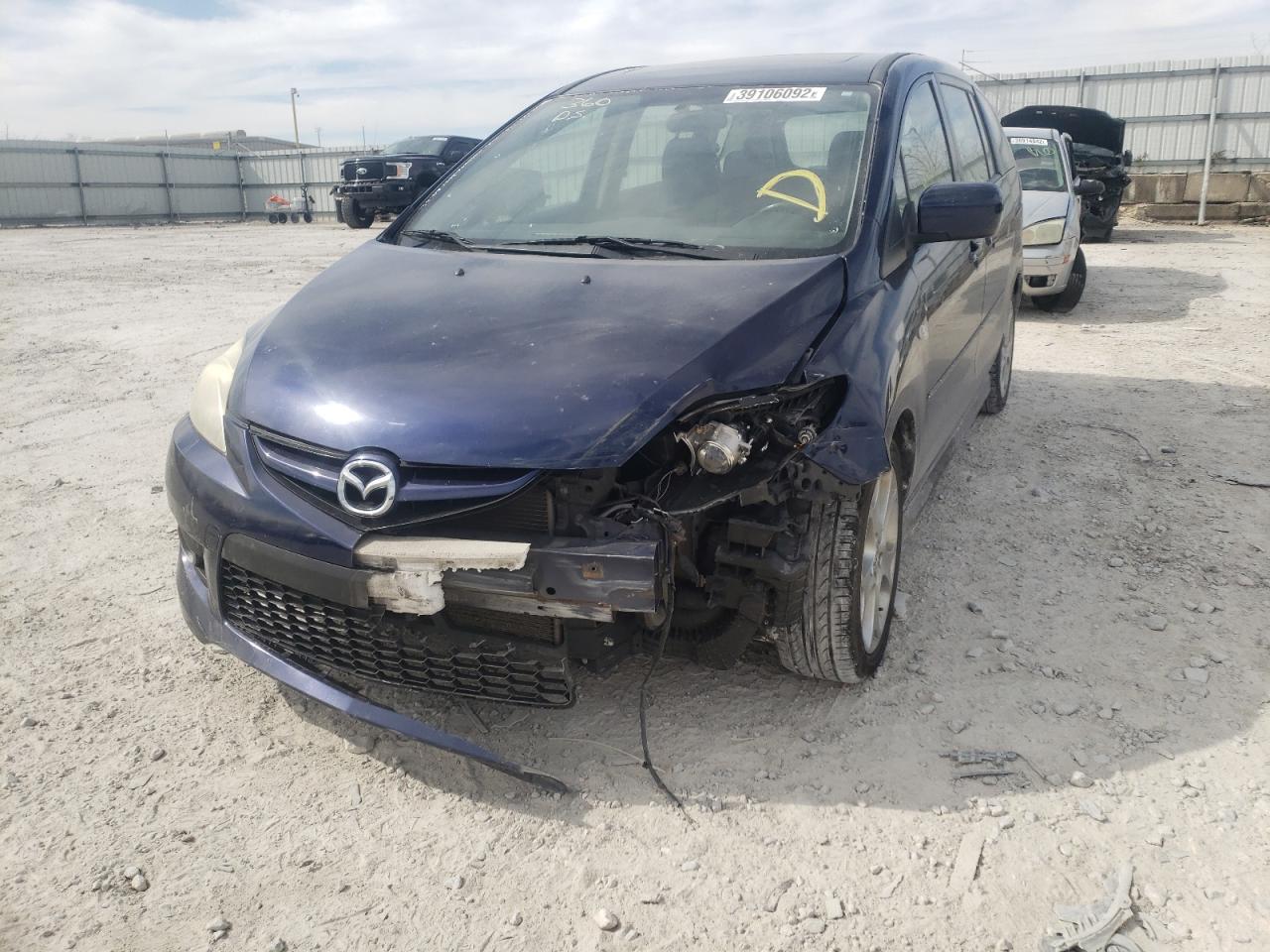 Photo 9 from auction – 2009 MAZDA 5 with VIN JM1CR293X90330947