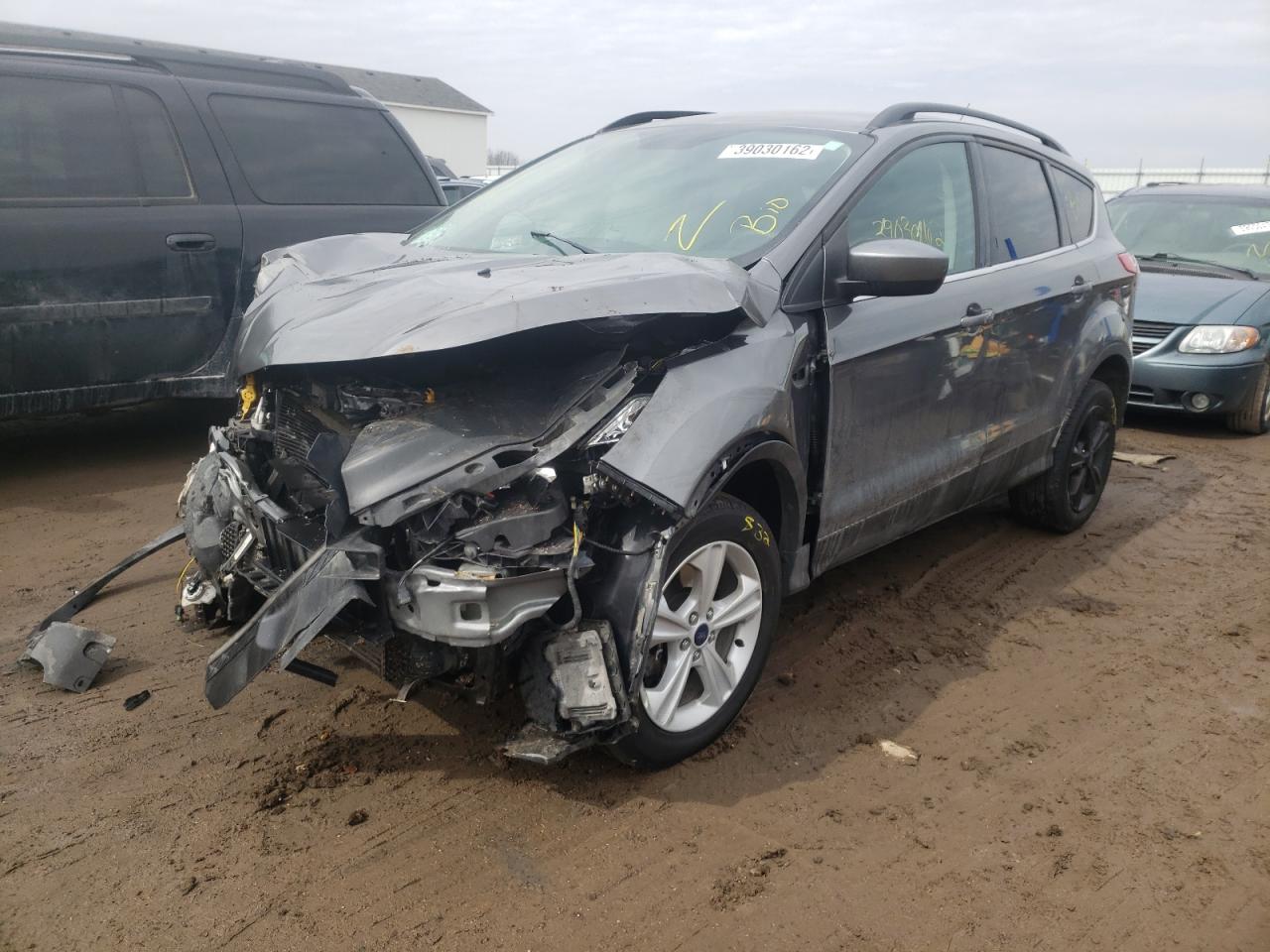 Photo 2 from auction – 2014 FORD ESCAPE SE with VIN 1FMCU9G95EUC00653