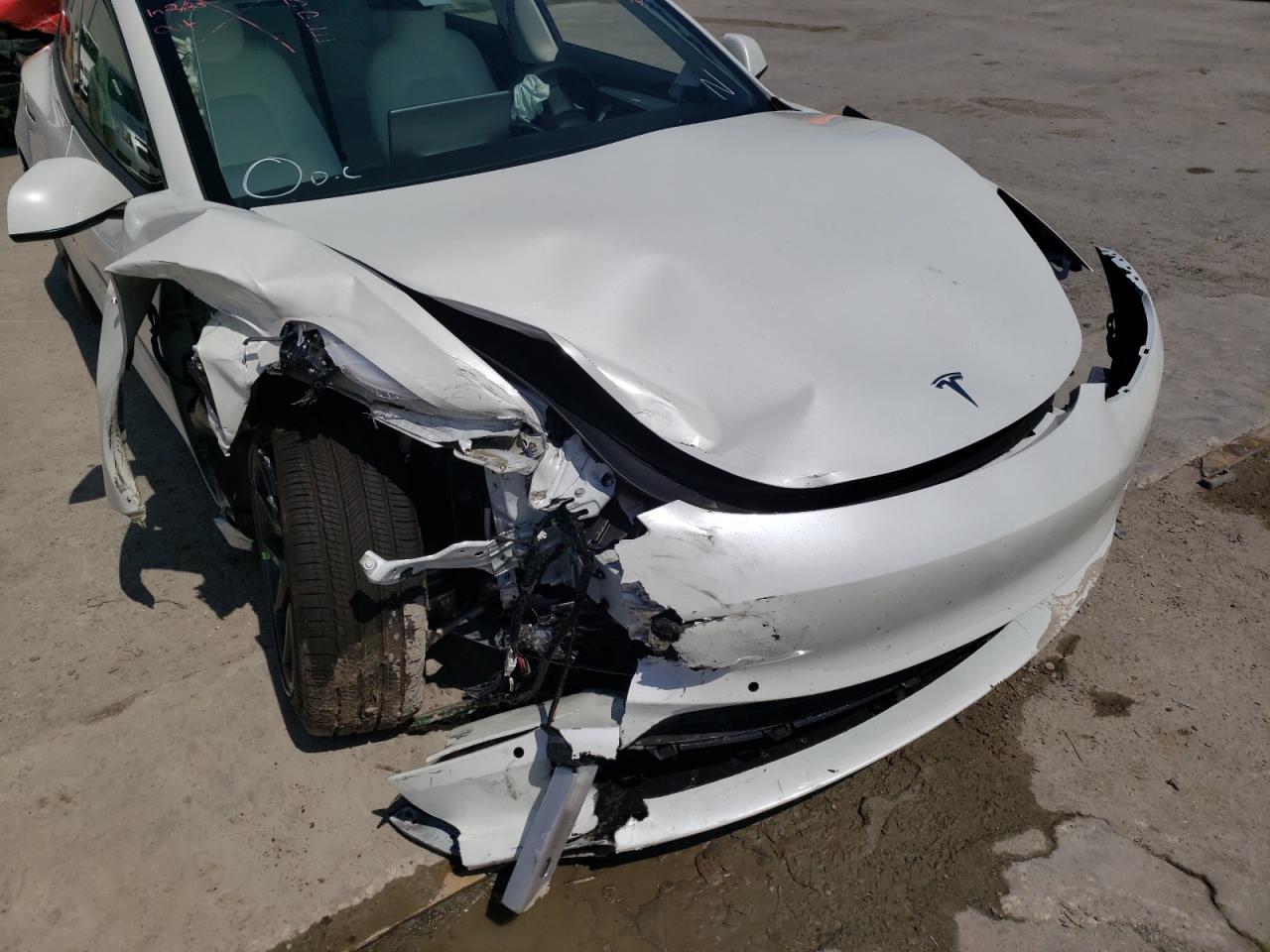Photo 9 from auction – 2021 TESLA MODEL 3 with VIN 5YJ3E1EA6MF045621